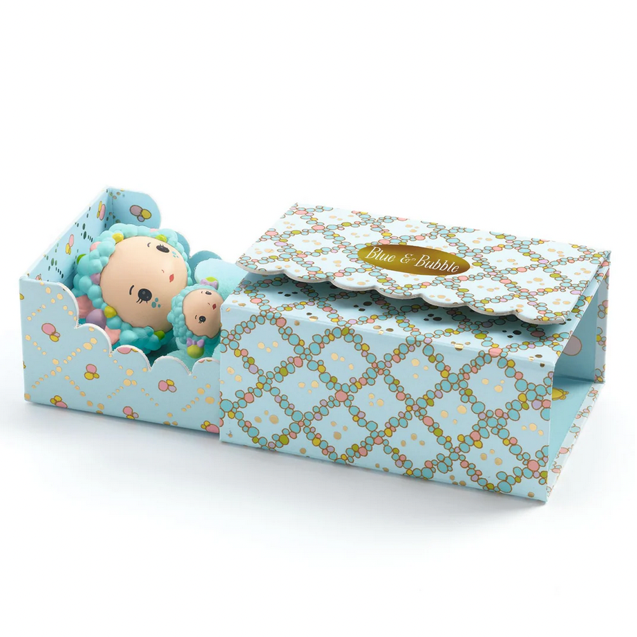Product packaging with a teddy bear and decorative box on a white background