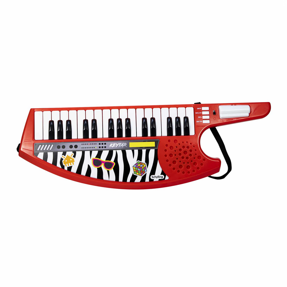 Red and black keyboard toy with zebra pattern on a white background