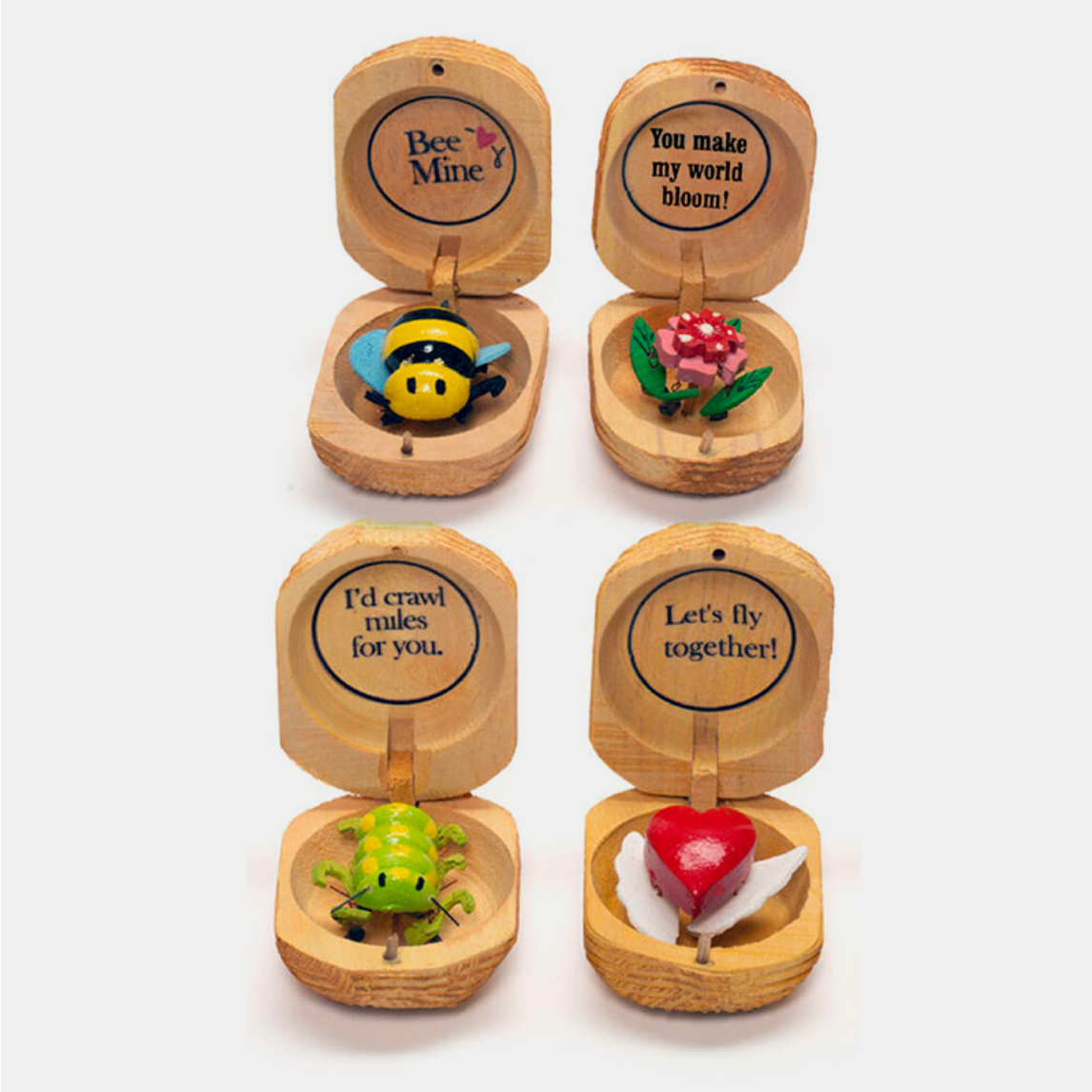 Set of wooden boxes with small figurines and romantic sayings on a white background
