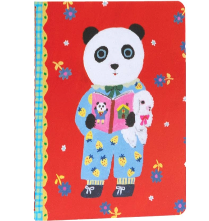 Notebook with panda design on a red background