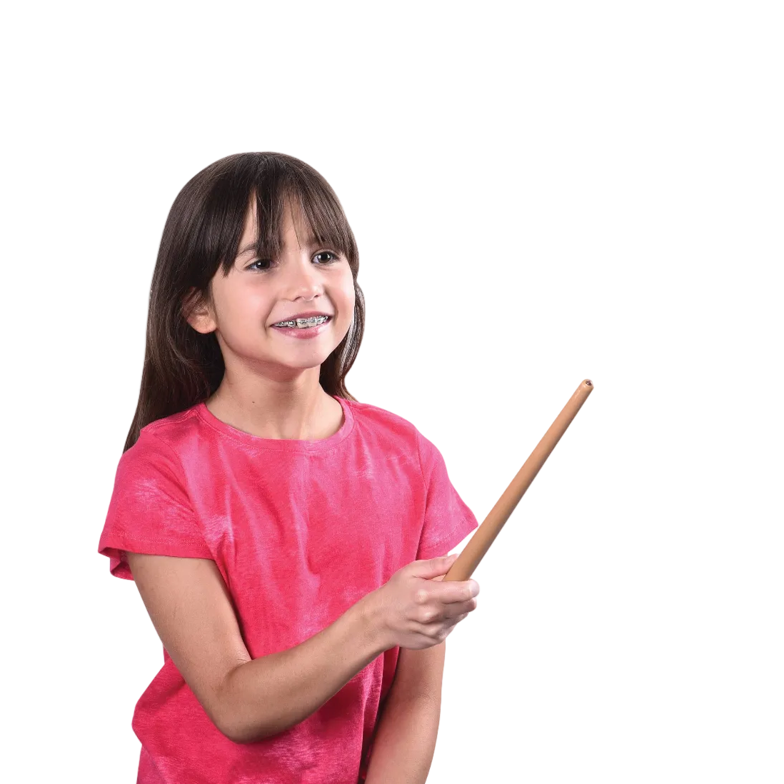 Young girl in a pink shirt holding a wooden stick on a white background