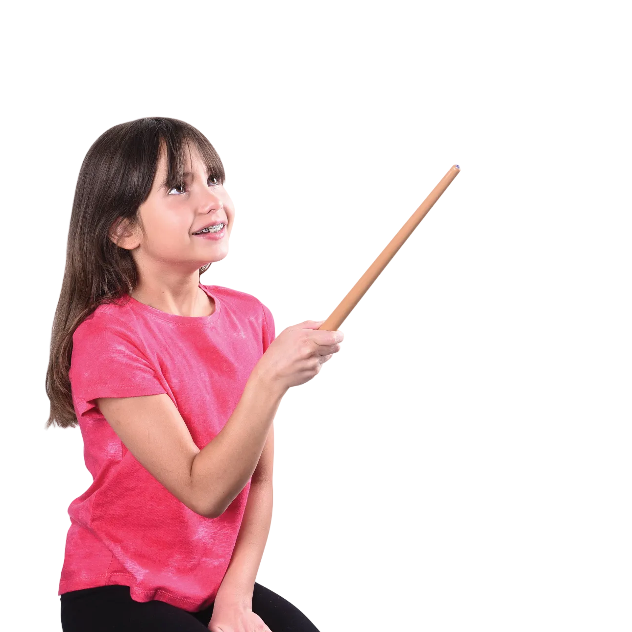 Child in a pink shirt holding a magic wand on a white background