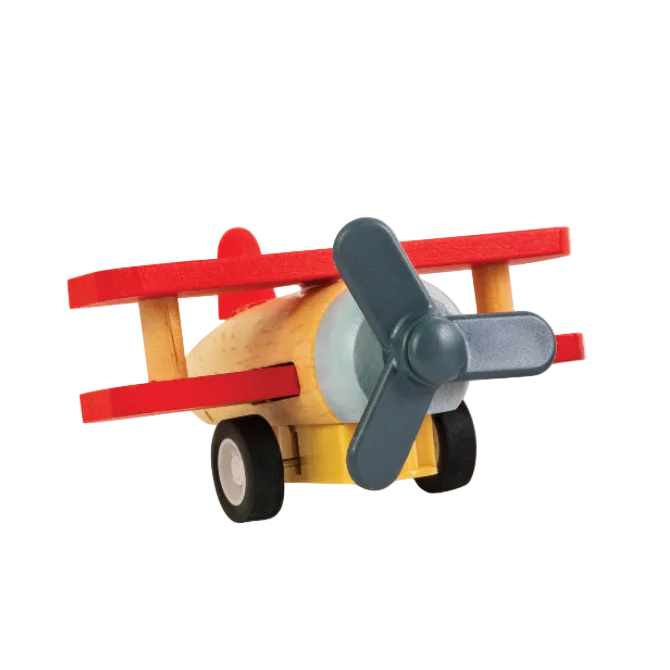 Toy airplane with red wings and a gray propeller on a white background