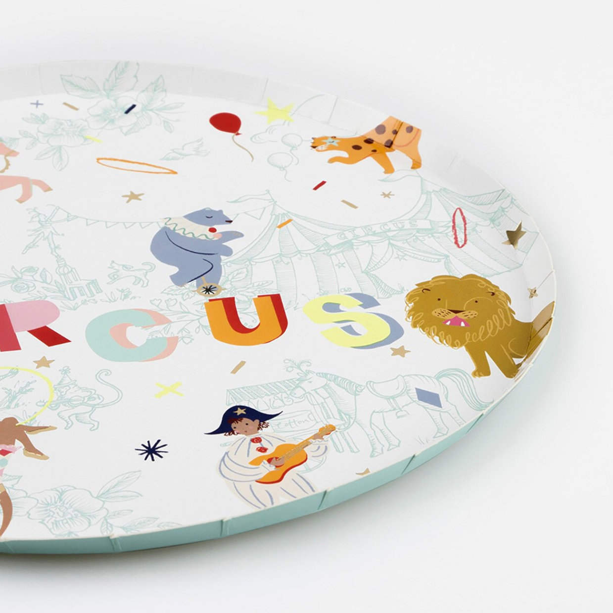 Round plate with circus-themed illustrations on a white background