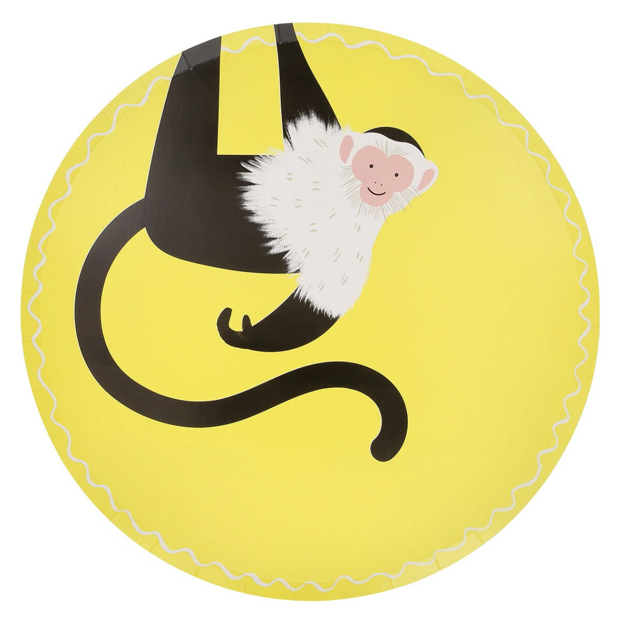 Round yellow cushion with a monkey design on a white background