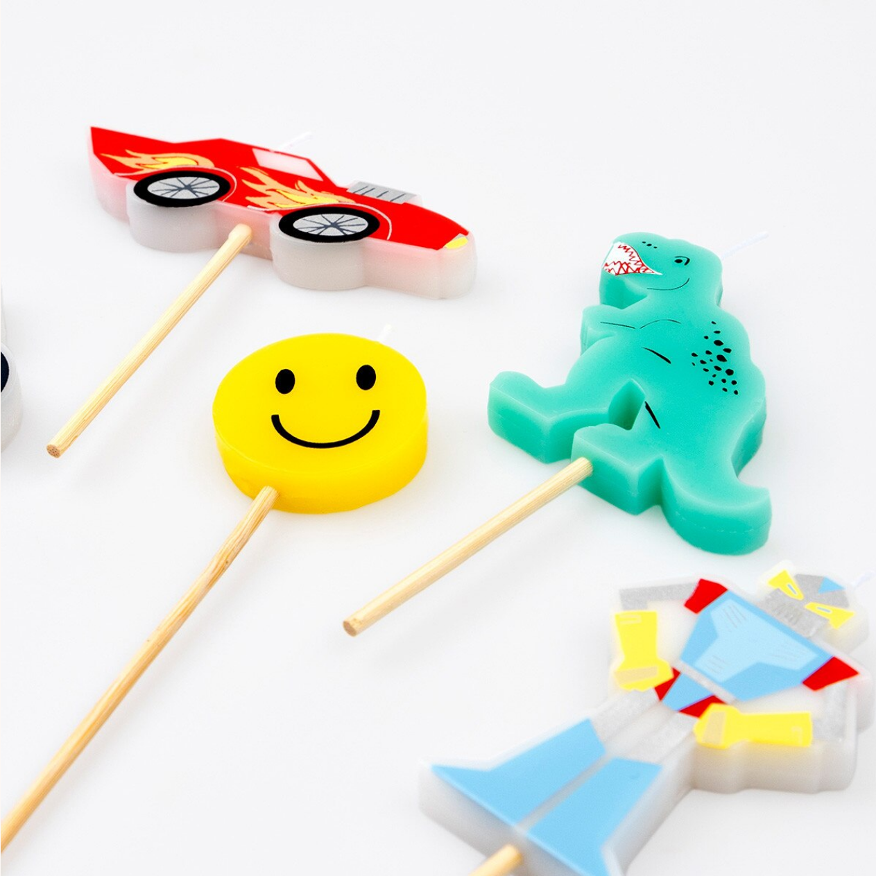 Colorful lollipops with sticks on a white background