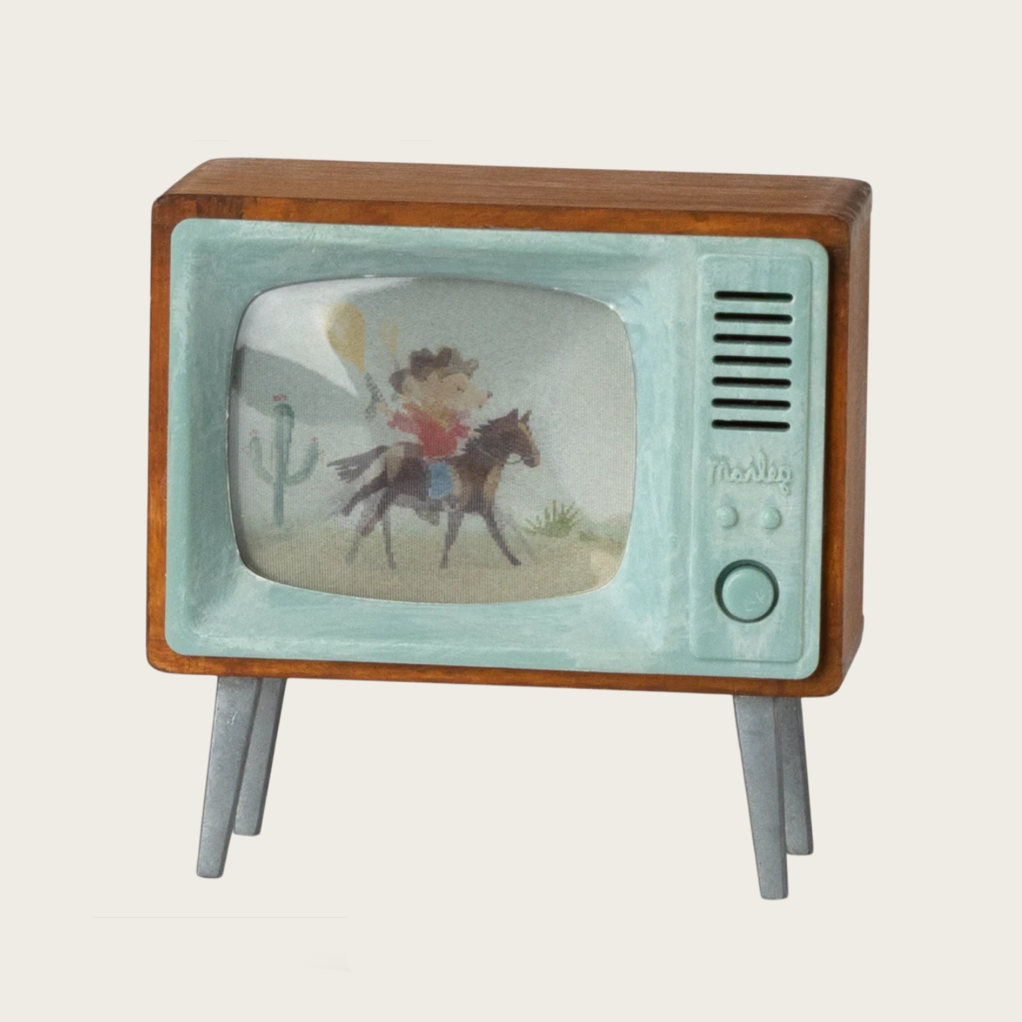 Vintage-style toy television with a cowboy on horseback on the screen