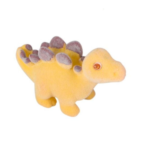 Yellow toy dinosaur with gray spines on a white background