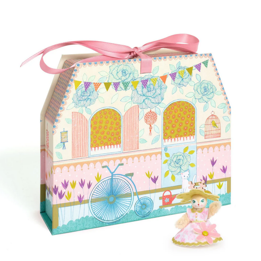 Decorative toy box with a bicycle and doll on a white background