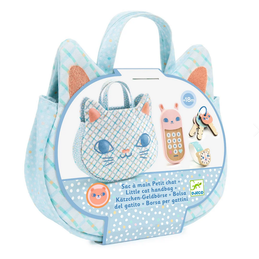 Children's toy handbag with cat design and accessories on a white background
