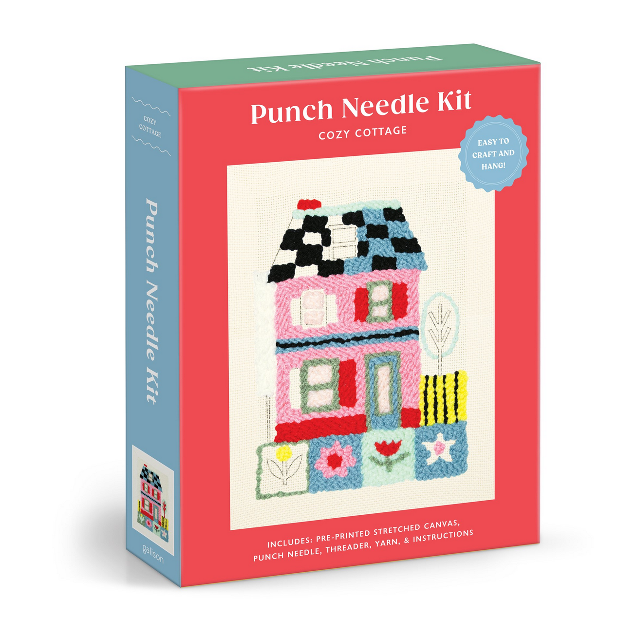 Punch needle kit packaging with a colorful cottage design on a white background