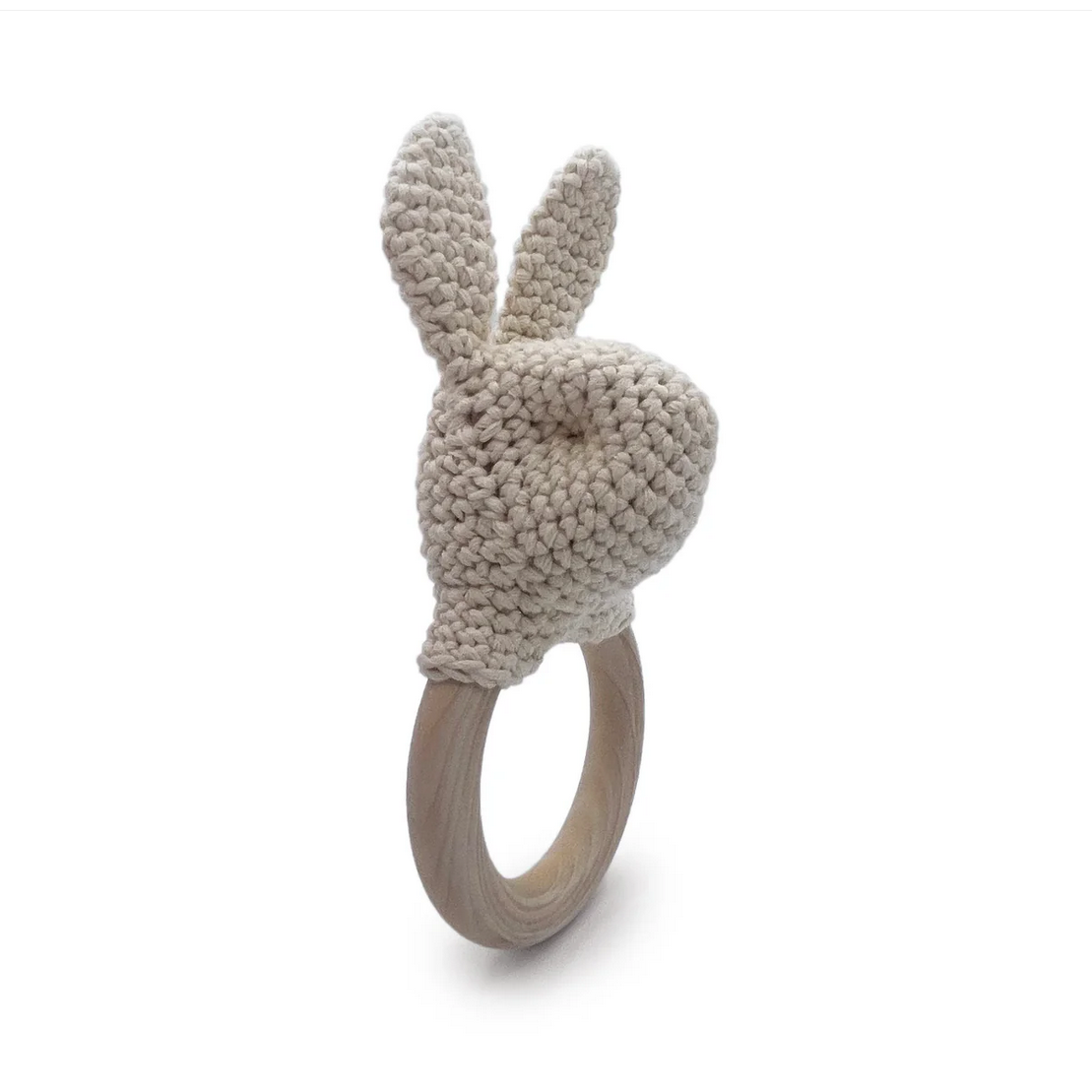 Textured bunny-shaped ring on a white background