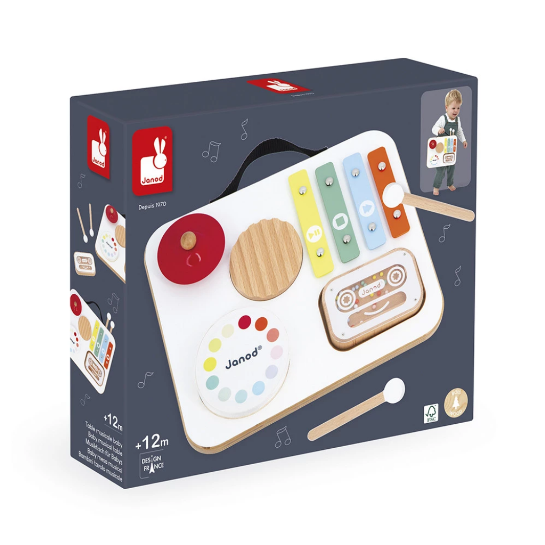 Toy packaging with musical instruments on a white background