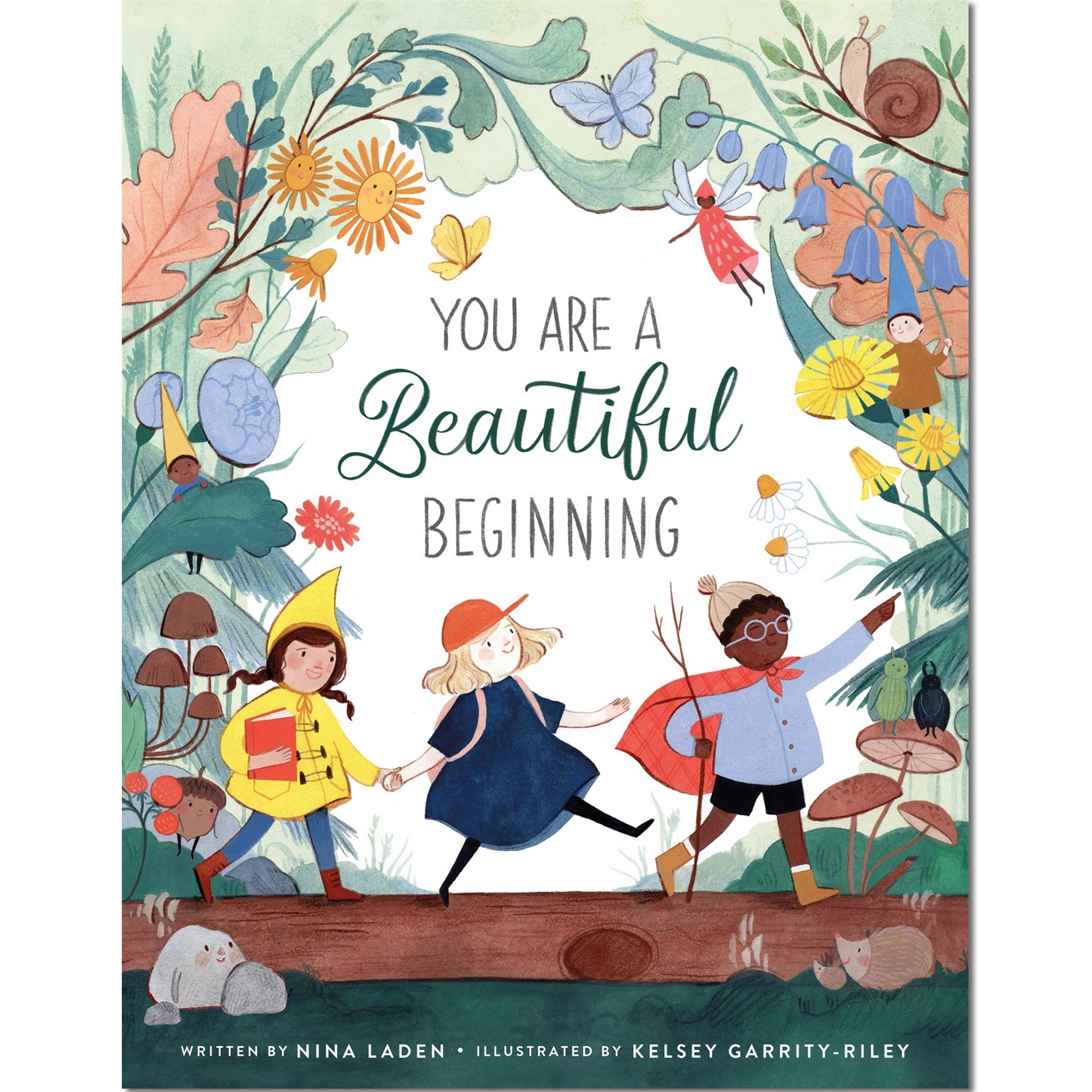 Book cover with children in colorful outfits and text 'You are a Beautiful Beginning' on a white background