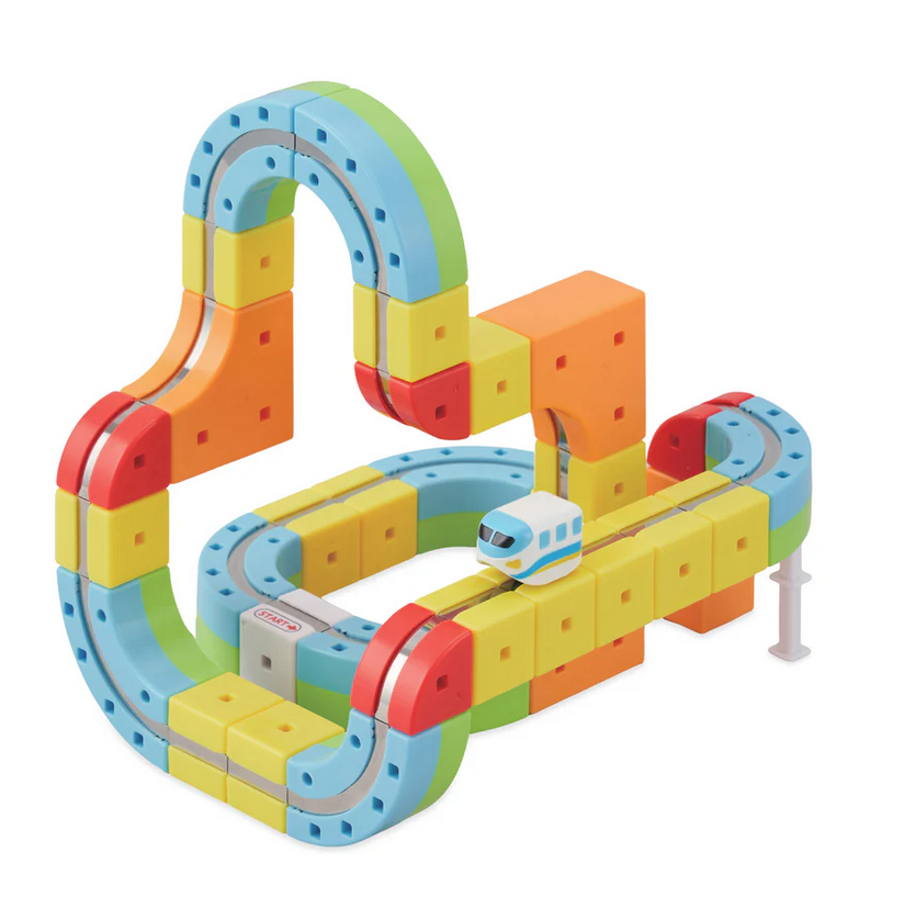Colorful toy track set with a train on a white background