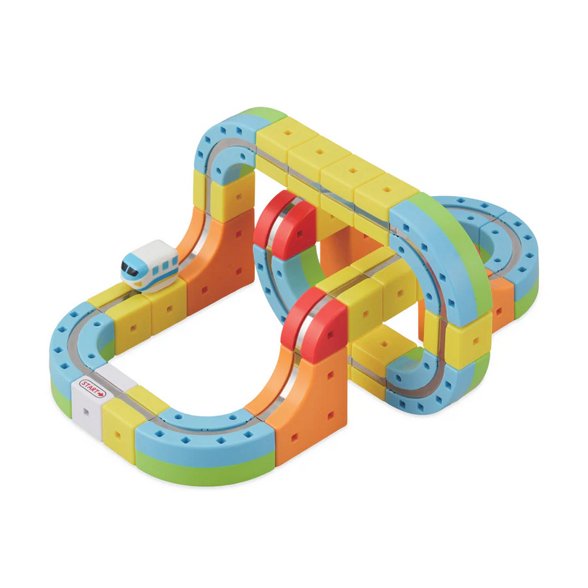 Colorful toy track set with a small car on a white background