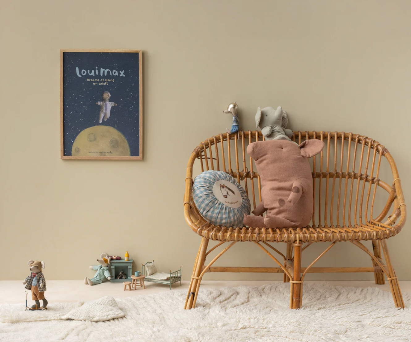 Children's room with a wicker chair, plush toys, and a framed picture on the wall.