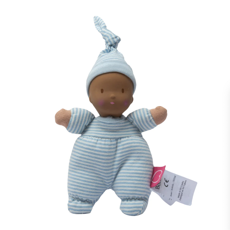 Baby doll with a tag on a white background