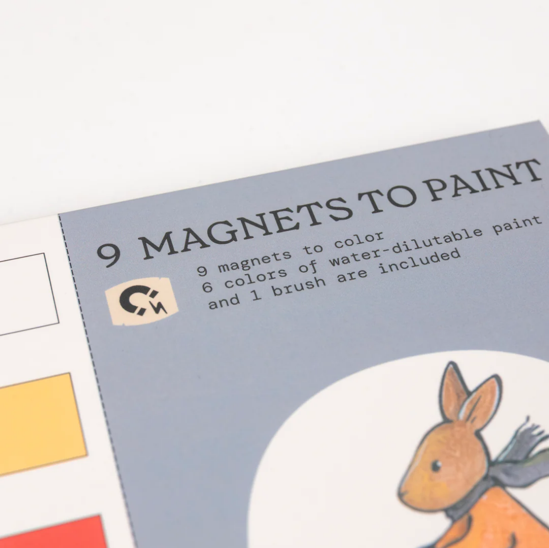 Product packaging for '9 Magnets to Paint' with a rabbit illustration and text about paint supplies.