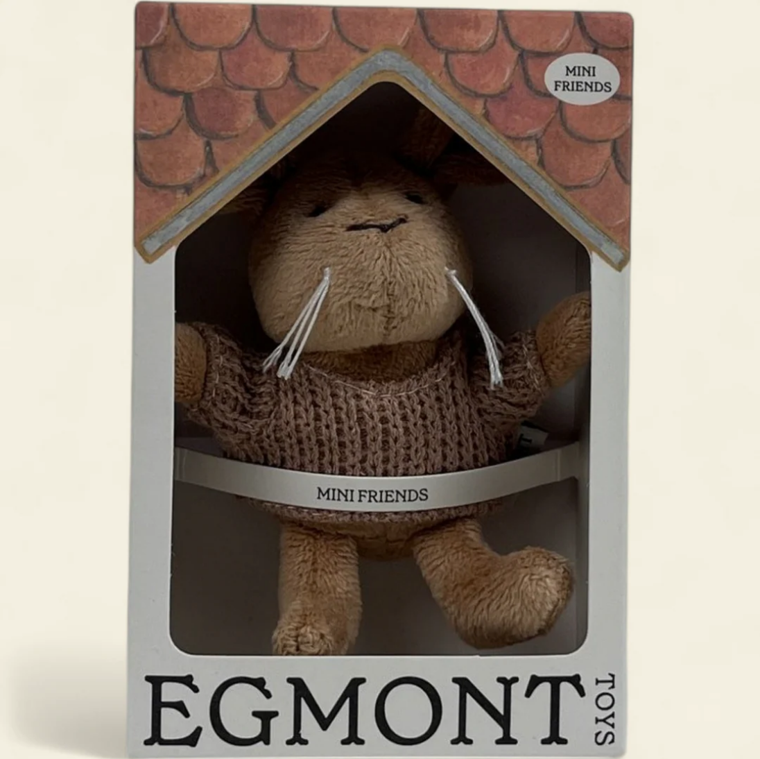 Plush toy in a packaging with 'Egmont Toys' branding