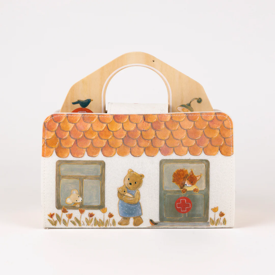 Decorative dollhouse with cartoon characters and a colorful roof on a white background