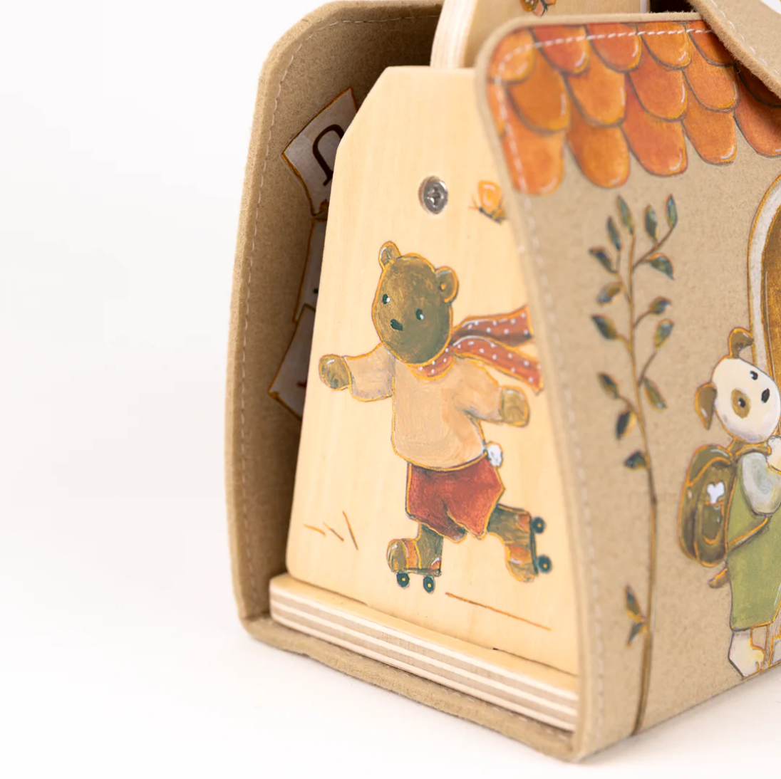 Wooden toy with bear design on a white background