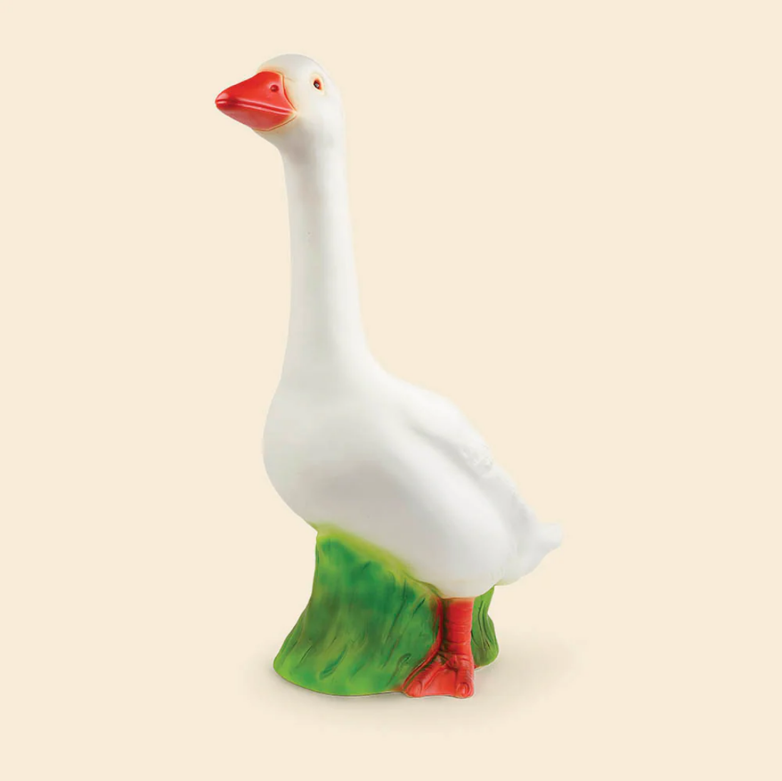 Decorative goose light with a red beak and green feet on a beige background