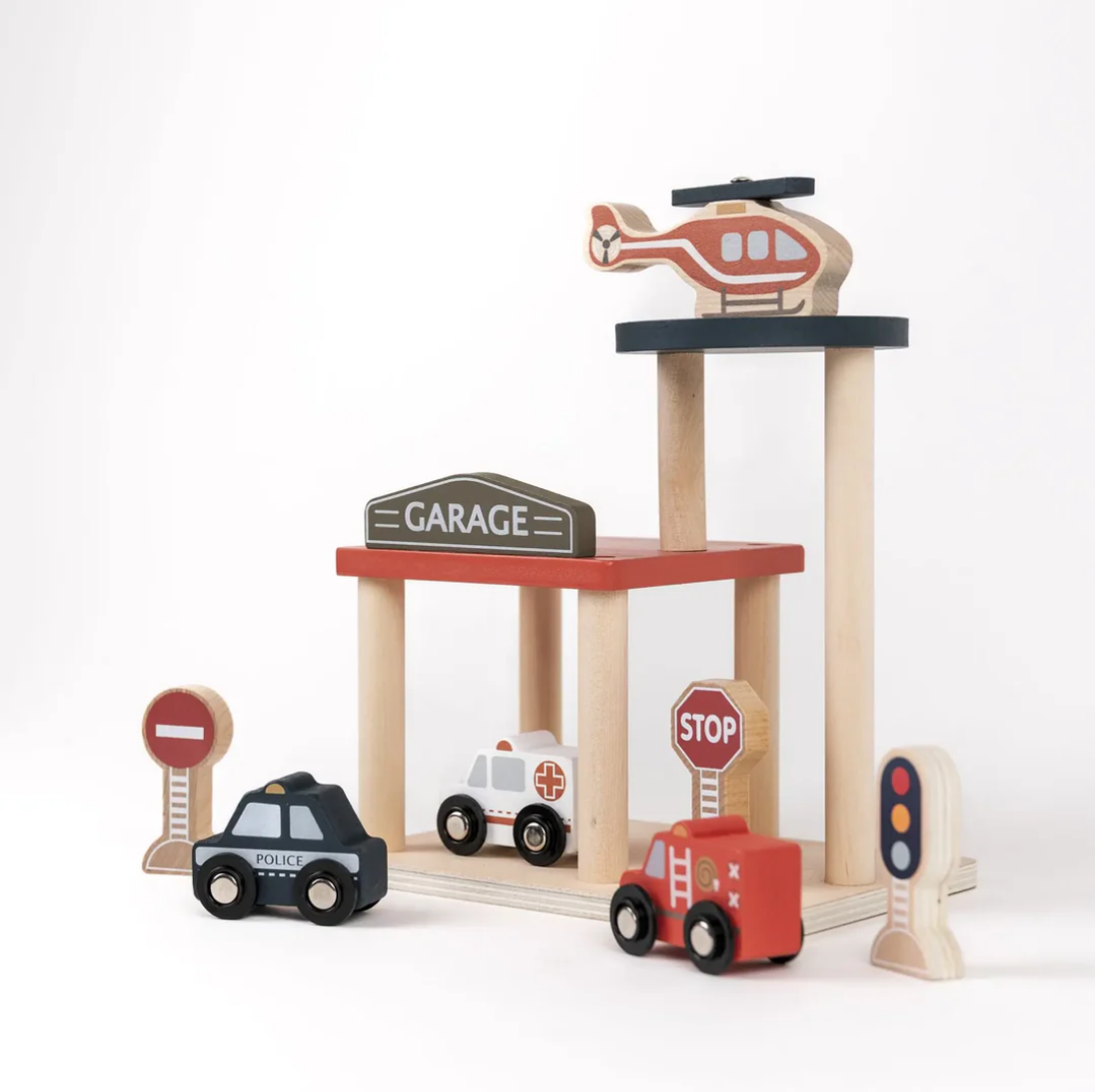Wooden toy garage set with vehicles and traffic lights on a white background