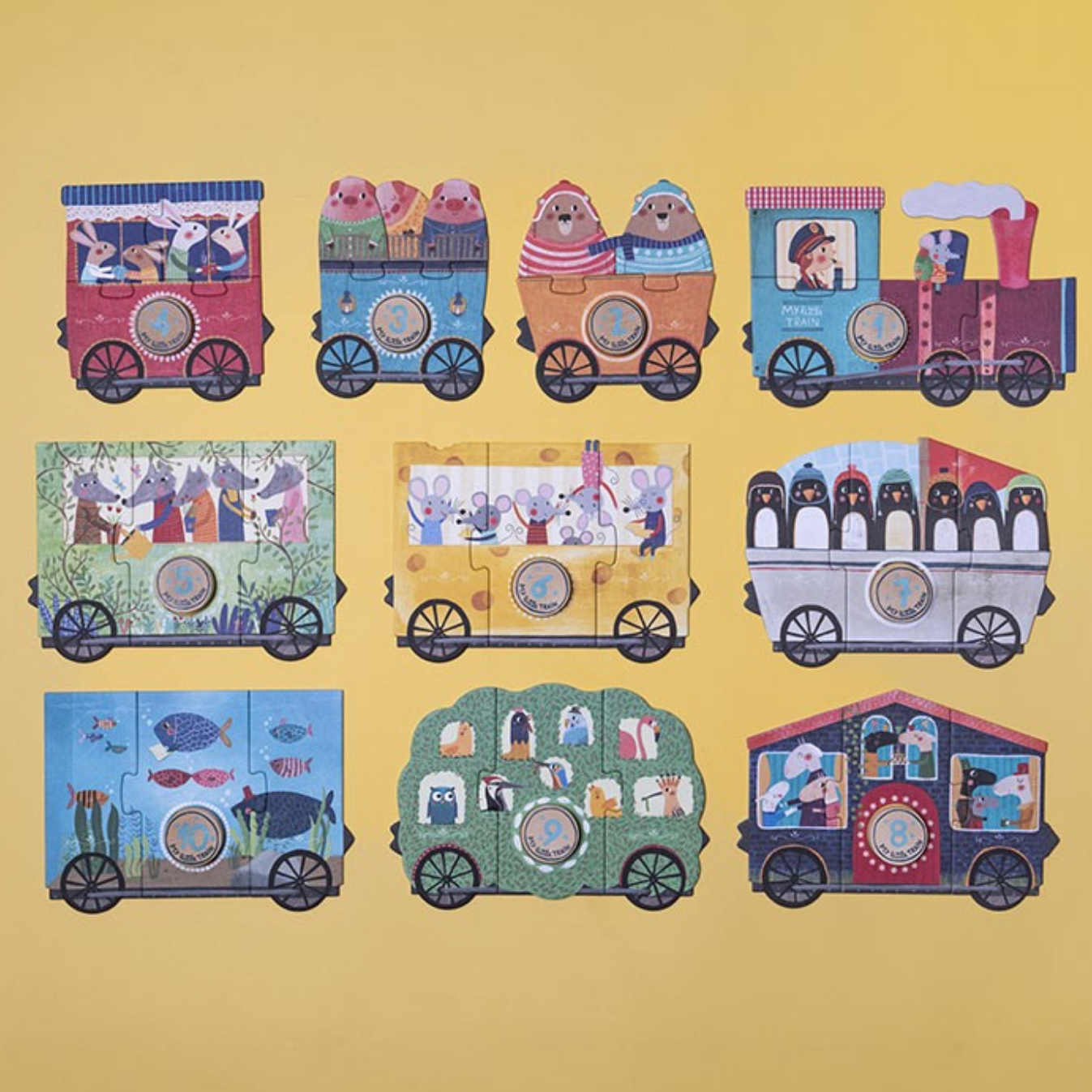 Colorful train-shaped toys with various designs on a beige background