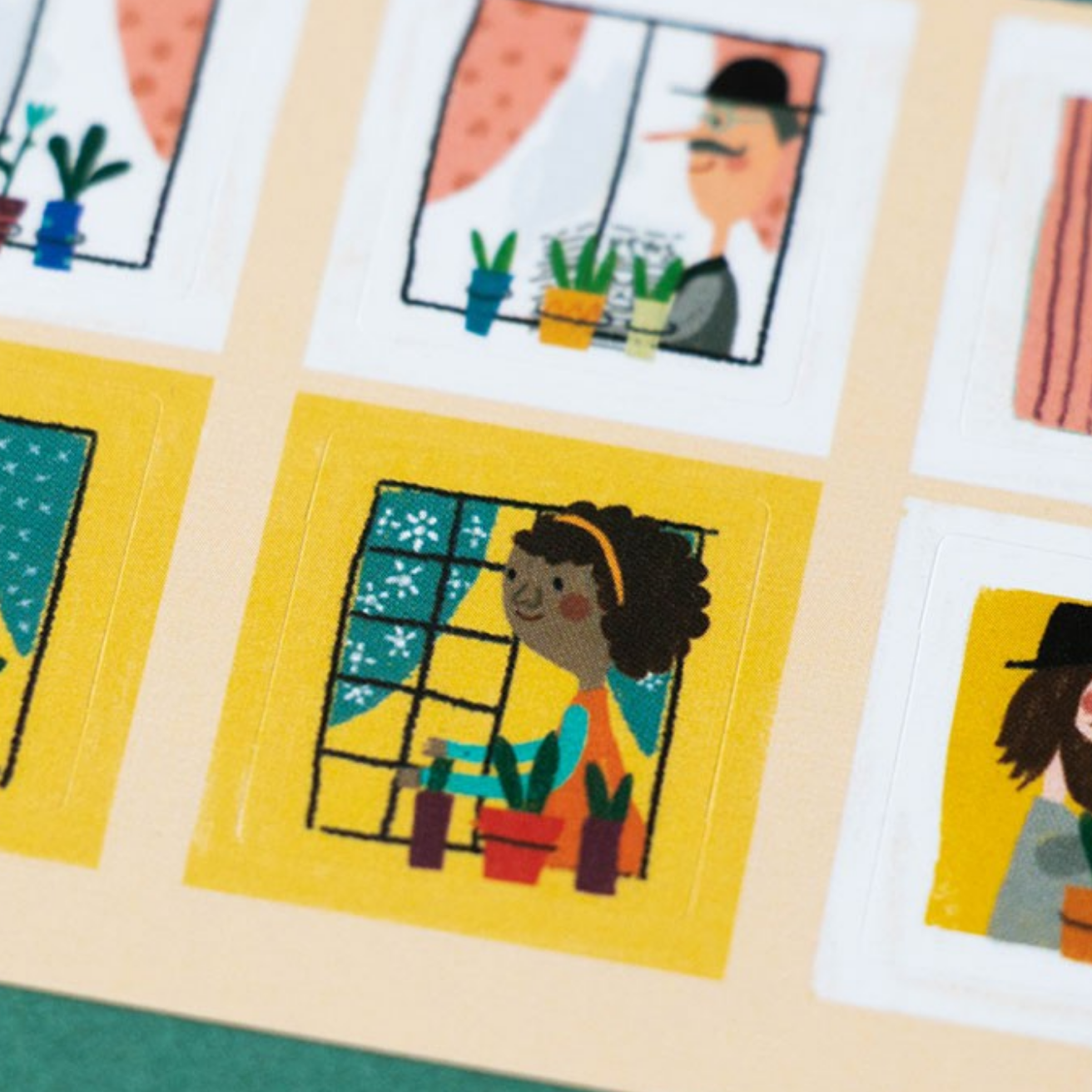 Illustrated cards with people and plants on a textured surface