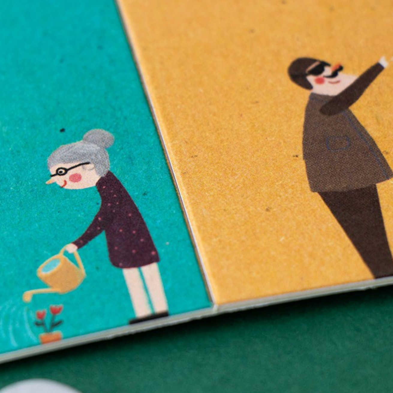 Illustration of a person watering a plant on teal paper and another person flying a kite on orange paper.