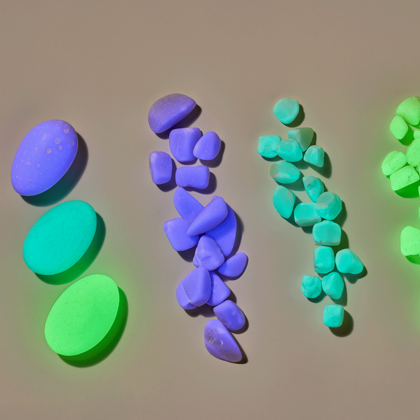 Colorful clay shapes on a beige background