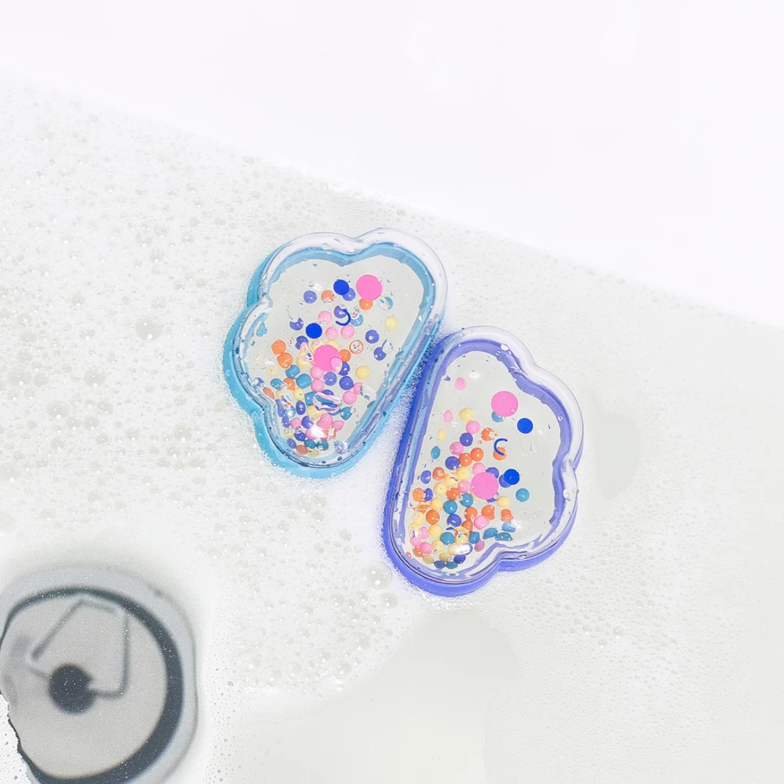 Colorful cloud-shaped containers with a white background