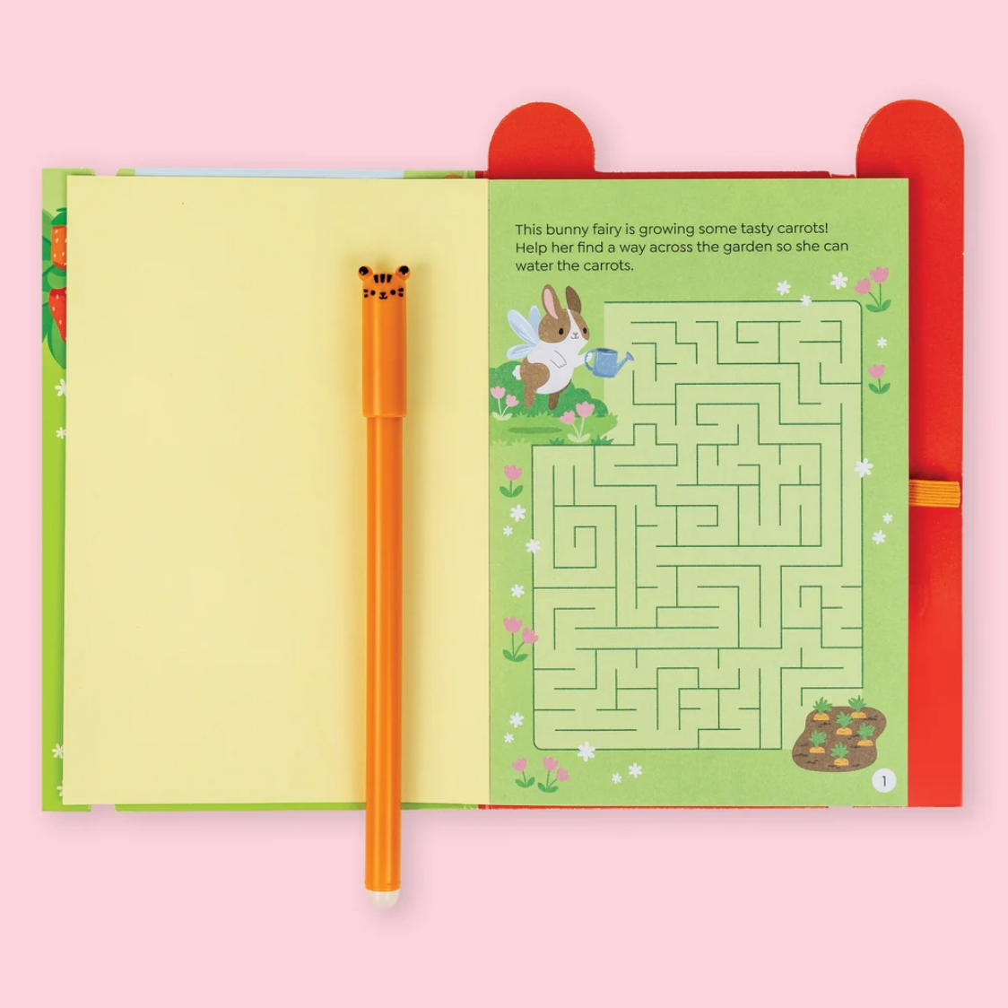Open book with a maze activity and a pencil on a pink background