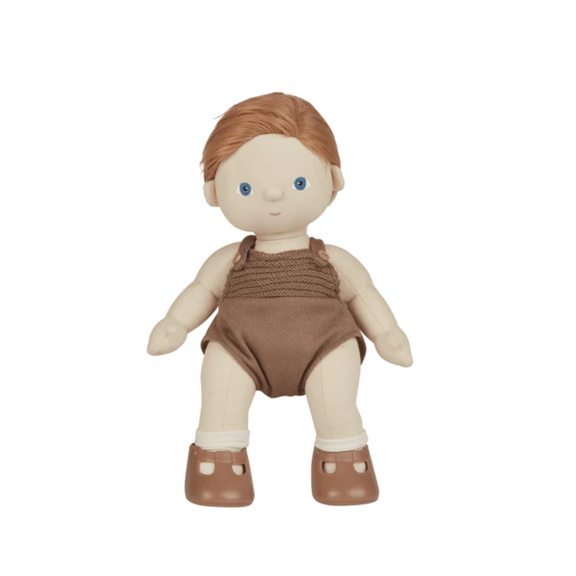 Toy doll with brown overalls and shoes on a white background