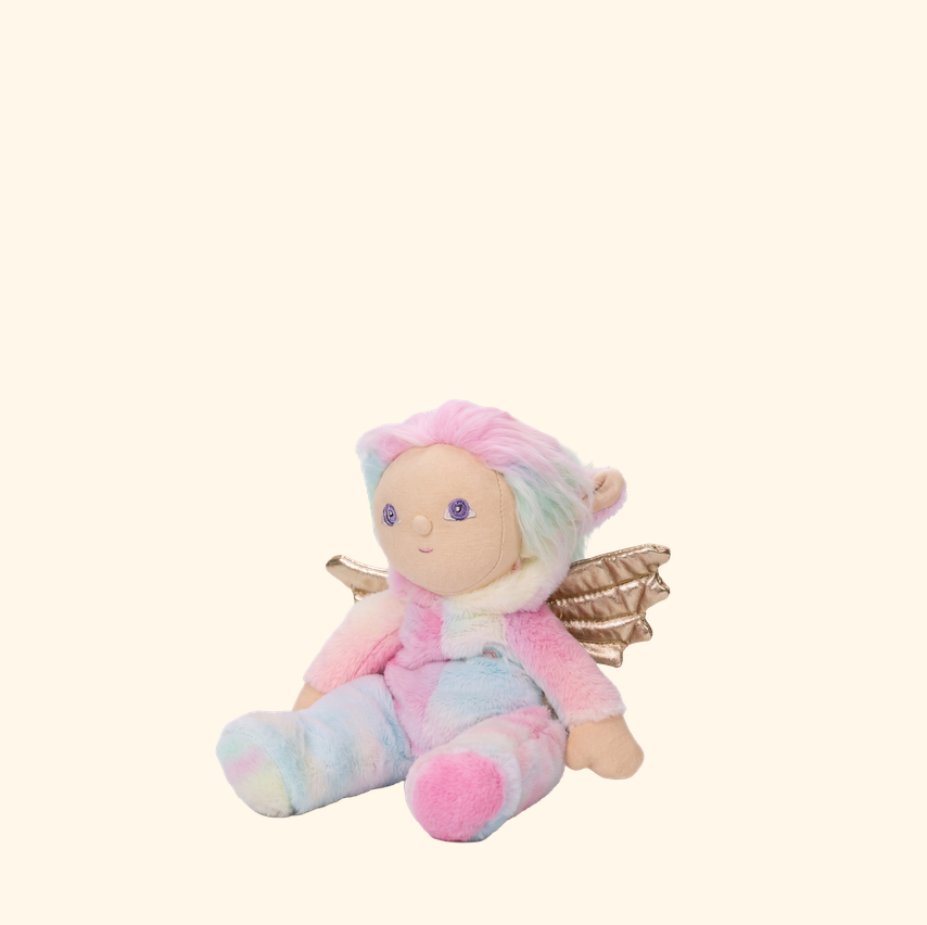 Plush toy fairy with pastel colors on a white background