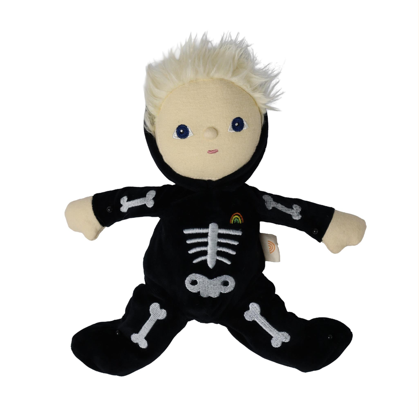 A plush doll with pale skin, blue eyes, and spiky white hair, wearing a black skeleton costume with white bone details, photographed on a plain white background.