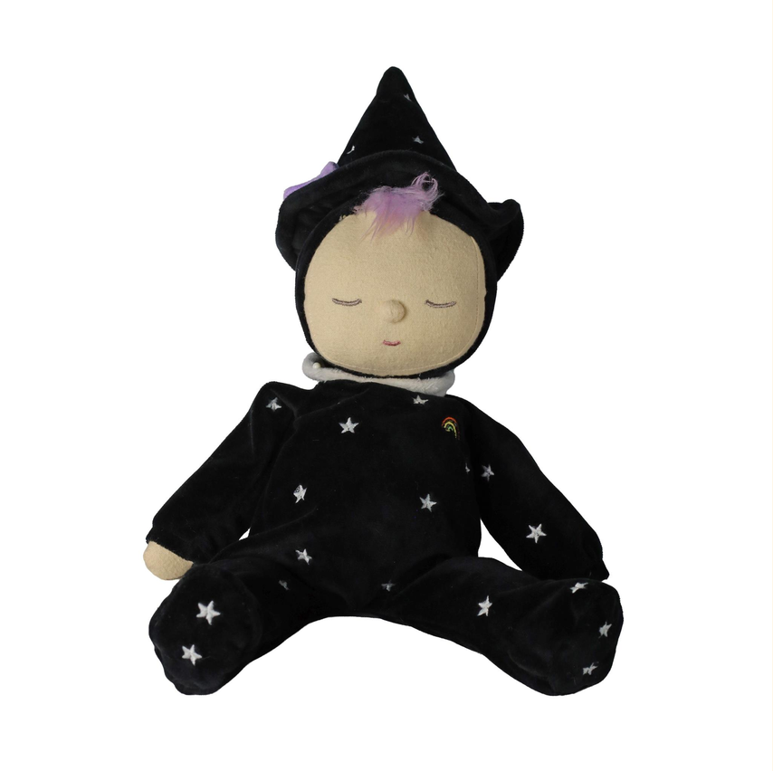 A plush baby doll with a sleeping face, wearing a black wizard hat and matching black starry onesie, isolated on a white background.