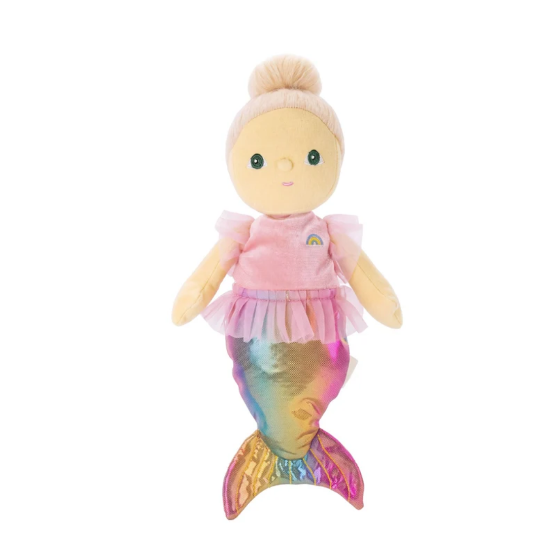 A mermaid-themed plush doll with a pale yellow face and hands, blonde hair in a bun, wearing a pink top with a small rainbow detail and a shimmering iridescent mermaid tail, isolated on a white background.