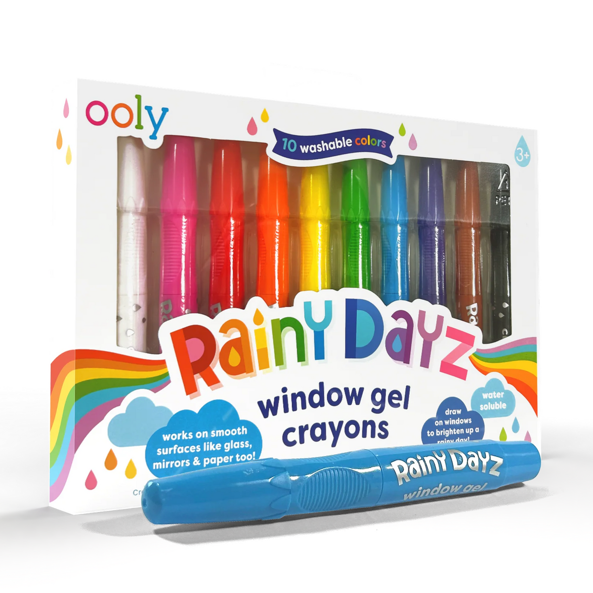 Ooly Rainy Dayz window gel crayons in a white box with a clear window, showing 10 colorful crayons inside. A blue crayon is placed in front of the box on a white background.