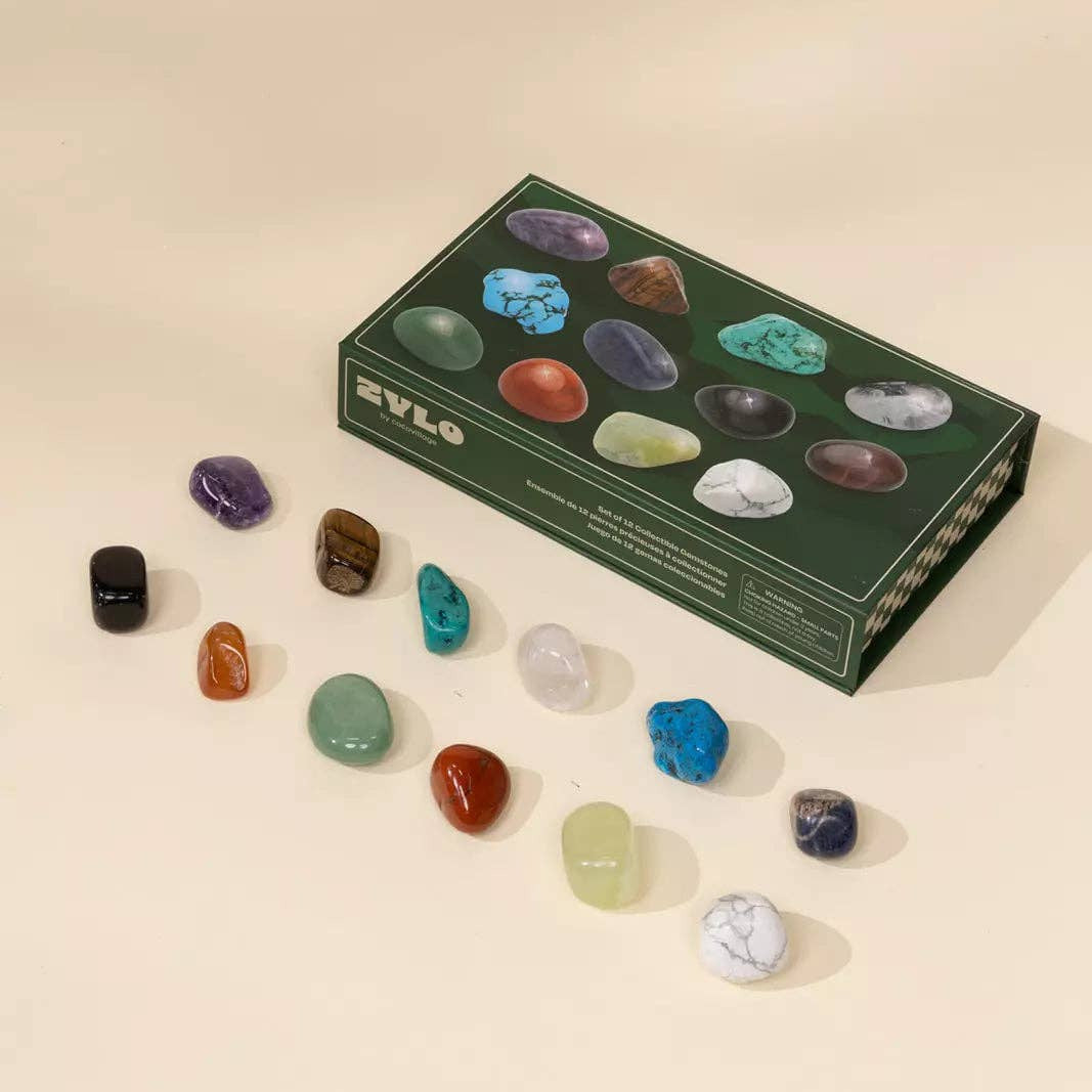 Set of colorful crystals with a green box labeled 'Zylo' on a beige background