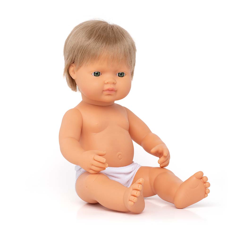 Baby doll with blonde hair and a diaper on a white background