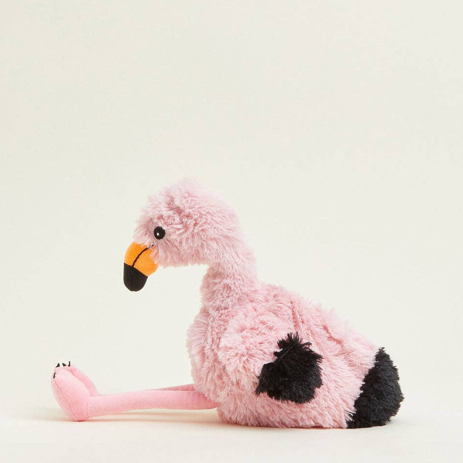 Plush flamingo toy on a light gray background
