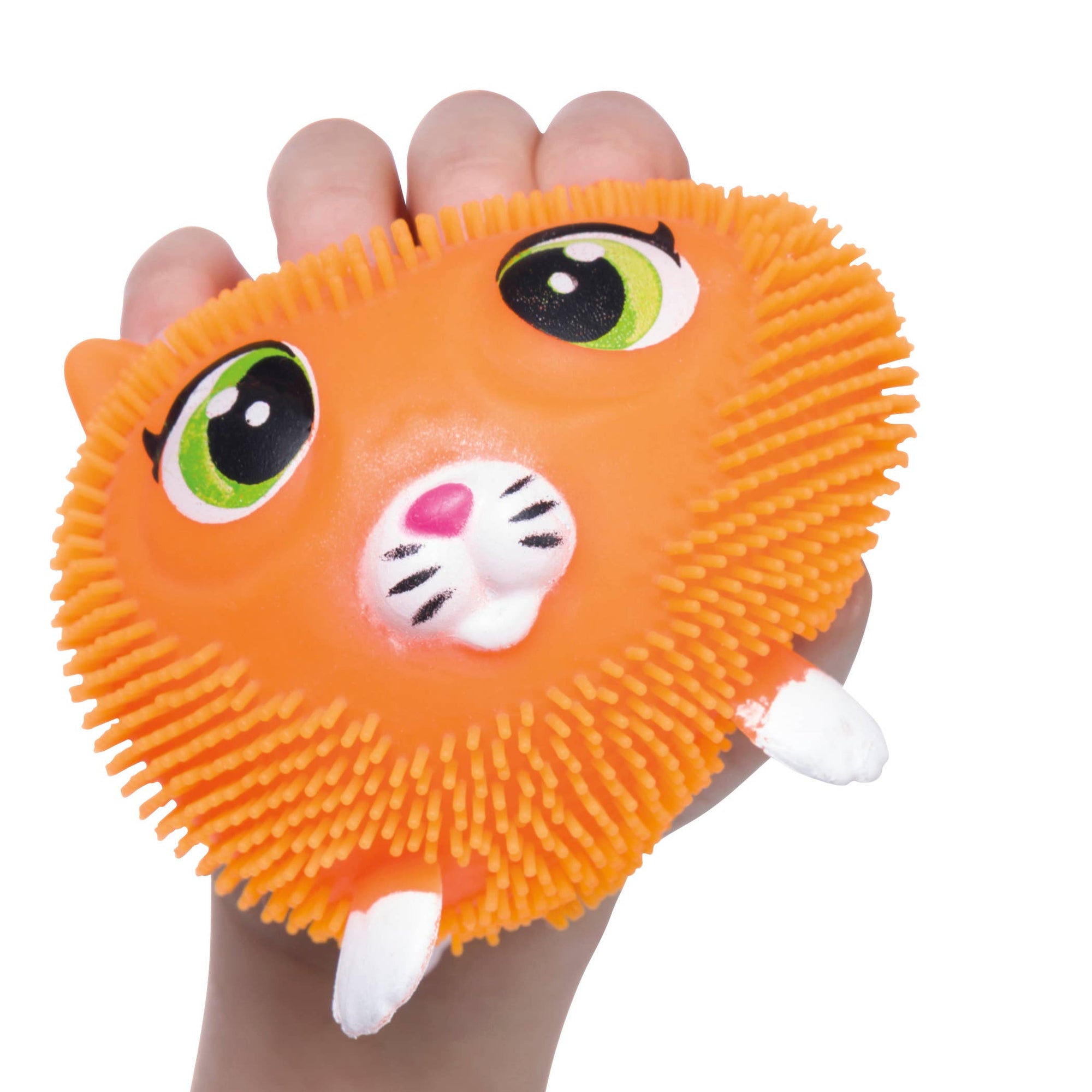 Orange cat-shaped toy held by a hand on a white background