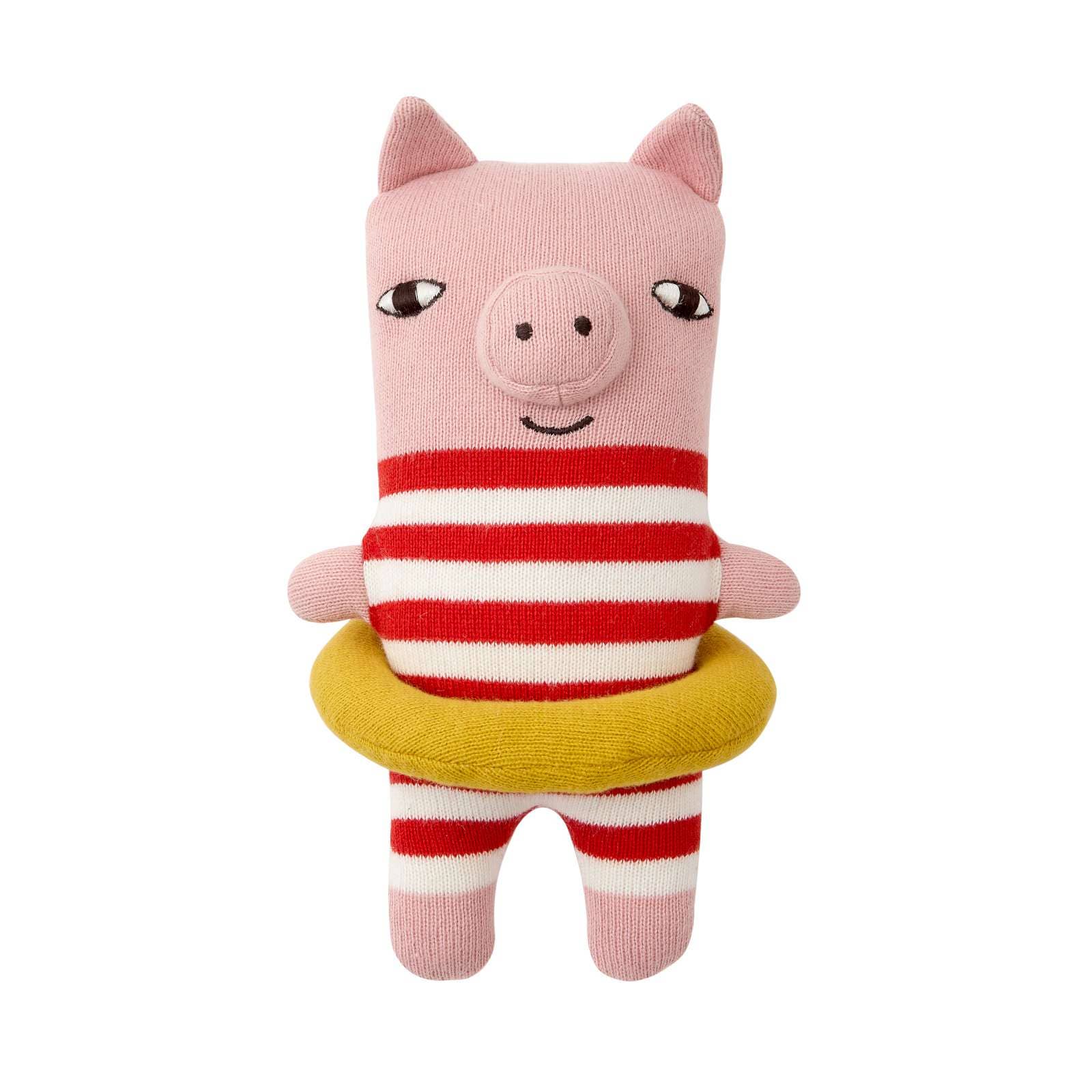 Pink plush toy pig with a red and white striped sweater and yellow life preserver on a white background