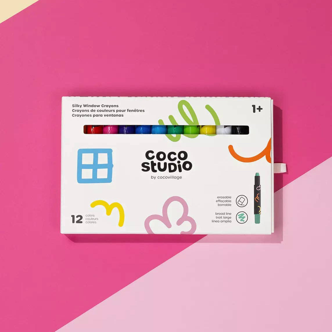 Coco Studio crayon set packaging on a pink and beige geometric background