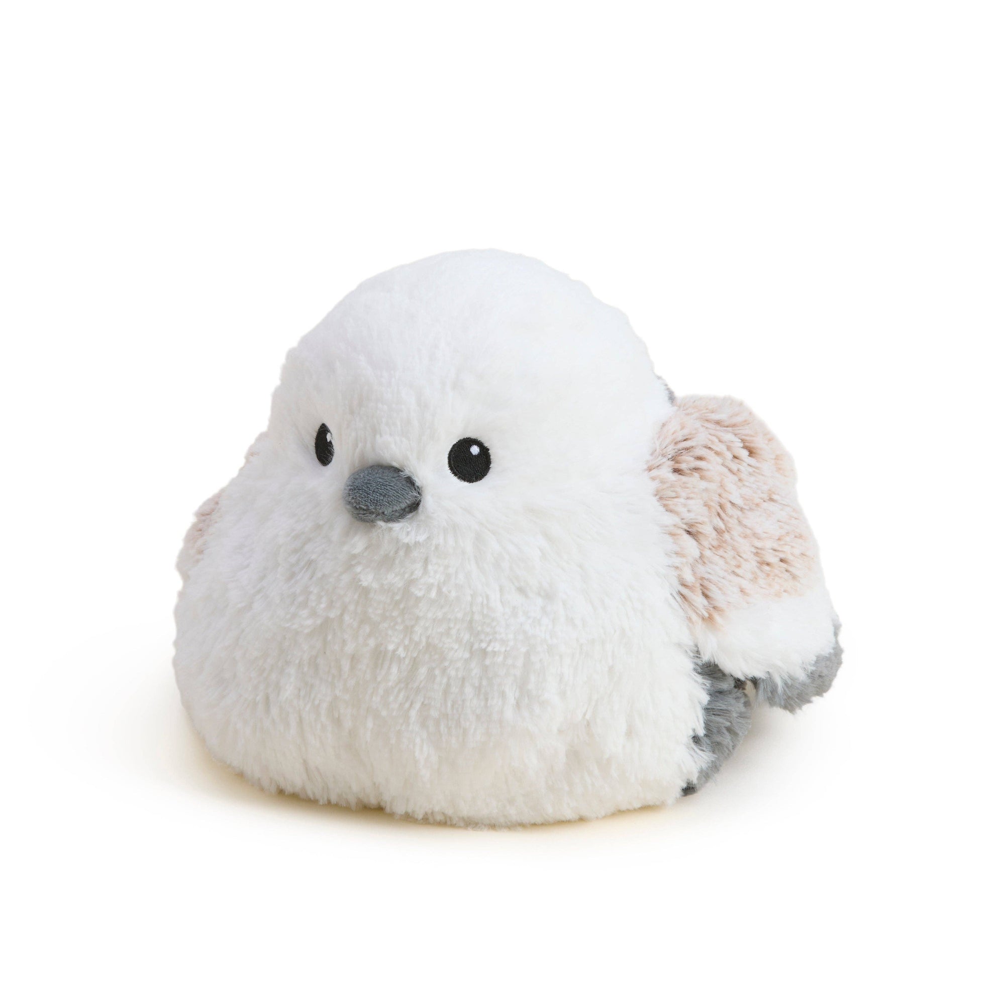 Plush toy bird with white body and brown wings on a white background