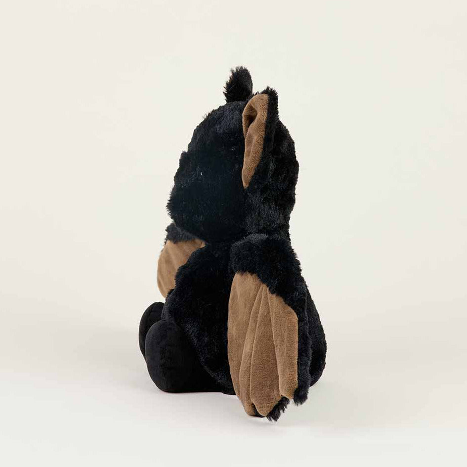Plush toy bear with brown paws and ears on a white background