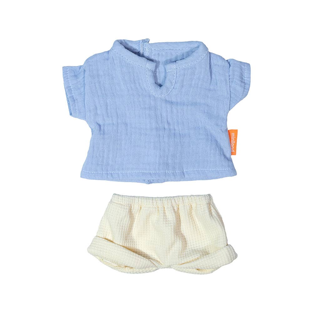 Blue doll's shirt and cream shorts set on a white background