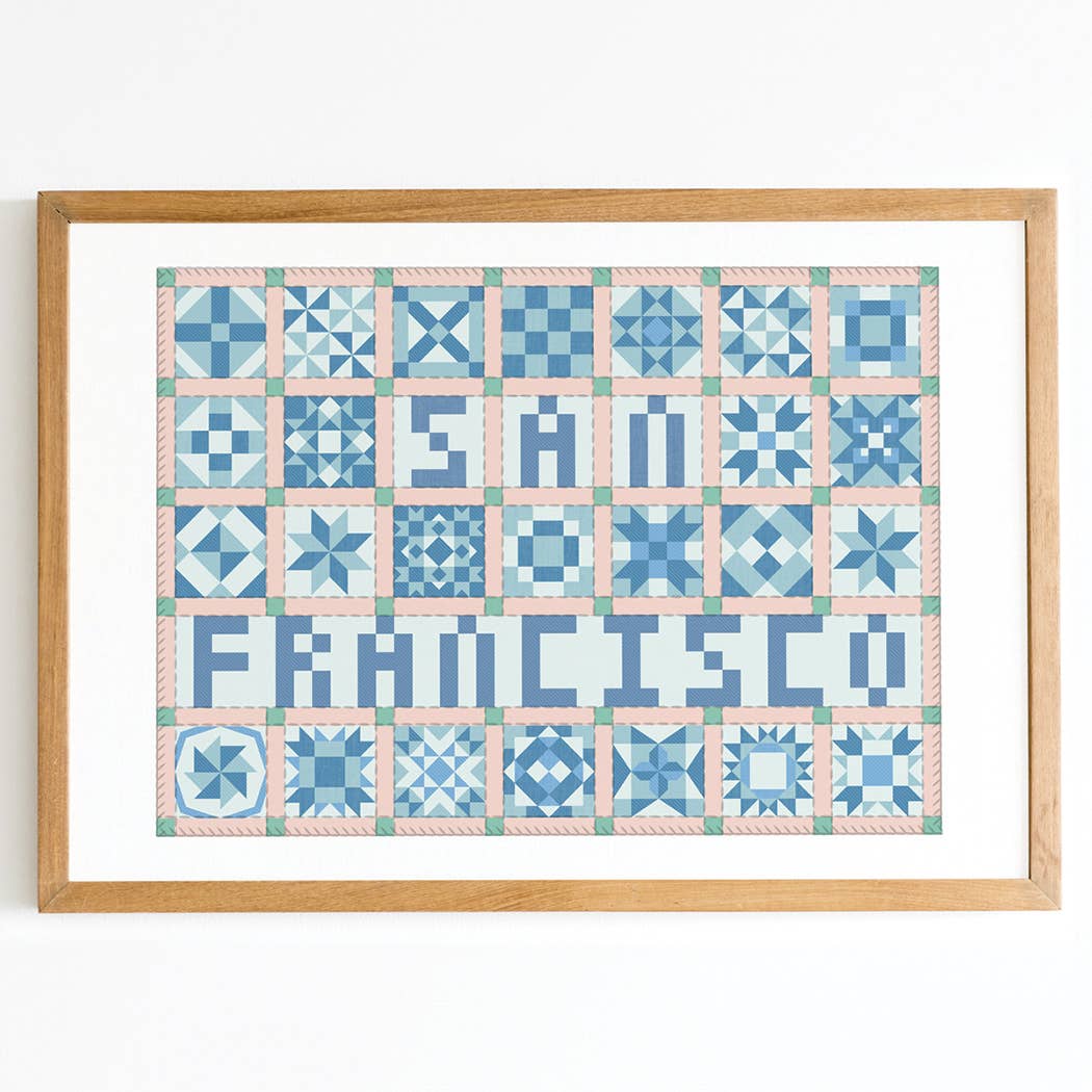 Framed cross-stitch pattern with 'Francisco' in a quilt-like design